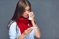 Illness woman holding thermometer and paper tissue. Royalty Free Stock Photo