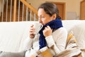 Illness woman in warm scarf Royalty Free Stock Photo