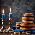 Concept of Jewish religious holiday Hanukkah, donuts and candles on a table with coin