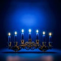 image of a lit menorah symbolizing the religious holiday of Hanukkah celebrating Jewish traditions