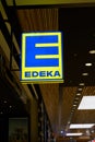 Illuminated advertisement of the food discounter Edeka in Germany
