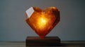 Illuminated Amber Heart Shaped Crystal Sculpture Royalty Free Stock Photo