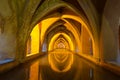 Illuminated ancient baths at the Alcazar in Seville Royalty Free Stock Photo