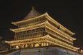 Illuminated ancient Drum Tower at the ancient city wall by night time, Xian, Shanxi Province, China Royalty Free Stock Photo