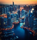 Illuminated architecture of Dubai Marina by night. Scenic blue hour skyline.