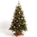 Illuminated artificial Christmas tree isolated on white