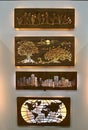 Illuminated backlit carved pictures of tree line, cityscape trees with moon and world map, made by LiGo company