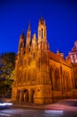 Illuminated old gothic Church in old Town at night Royalty Free Stock Photo