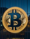 Illuminated Bitcoin Symbol in Urban Setting