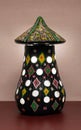 Illuminated black painted pottery table lamp