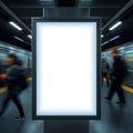 Illuminated blank display board stands in a subway station with blurred people passing by on the platform Royalty Free Stock Photo