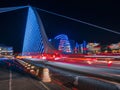 Illuminated in blue color and made in a shape of traditional Irish Harp Samuel Beckett Bridge in Dublin city, Ireland. Famous