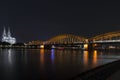 Illuminated bridge in Cologne at night