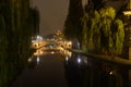 Illuminated bridge over the river in the city Royalty Free Stock Photo