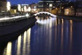 Illuminated bridge over the river in Moscow in the evening in winter Royalty Free Stock Photo