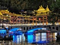 Illuminated bridge over the Youshui River in Furong Ancient City in Hunan Province in China