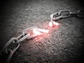 Illuminated broken chain part on the ground. 3D illustration Royalty Free Stock Photo