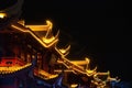 Illuminated buildings' rooftops of the Impression Water street in Meishan city, China