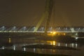 Illuminated cable-stayed bridge over the Yamuna River at night. Signature Bridge. Delhi India Royalty Free Stock Photo