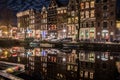 Kloveniersburgwal canal in Amsterdam at night Royalty Free Stock Photo