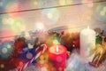 Illuminated candles with Christmas decorations Royalty Free Stock Photo