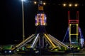 Illuminated carousel ride in amusement park Royalty Free Stock Photo