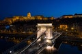 Illuminated Chain Bridge and Buda Castle in twilight, Budapest Royalty Free Stock Photo