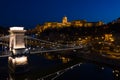 Illuminated Chain Bridge and Buda Castle in twilight, Budapest Royalty Free Stock Photo