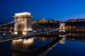 Illuminated Chain Bridge and Buda Castle in twilight, Budapest Royalty Free Stock Photo