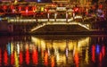 Illuminated Chinese Gate Grand Canal NIght Reflection Hangzhou Zhejiang China