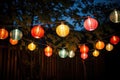 illuminated chinese lanterns hanging in a festoon