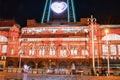 Illuminated Christmas market in front of a historic building at night with festive decorations and lights in Blackpool Royalty Free Stock Photo