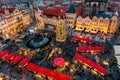 Illuminated Christmas tree, kiosks and people on Old Town Square in Prague Royalty Free Stock Photo