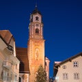 Illuminated church mittenwald village, upper bavaria, christmas season