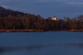 Illuminated church above a lake in Bavaria