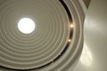 Illuminated circular skylight seen from below, concentric circles