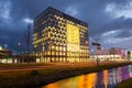 Illuminated city hall dutch: Huis van de Stad in Gouda, Holland at night