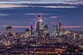 The illuminated City of London at night time, UK