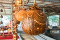 Illuminated Classic Carved Wooden Lamp made from Dry Coconut Hanging from Ceiling