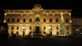 Illuminated classical building with a Christmas tree in Valletta Malta Royalty Free Stock Photo