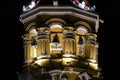 Close-up of illuminated clock tower of church of Saint Barbara at night, Santa Cruz de Mompox, Colombia, World Heritage Royalty Free Stock Photo