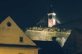 Illuminated clock tower of Petrovaradin Fortress at night Royalty Free Stock Photo