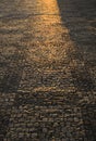 Illuminated cobbled street