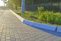 Illuminated cobbled street of the city in summer