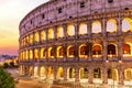Illuminated Coliseum at sunrise beautiful side view, Rome, Italy Royalty Free Stock Photo