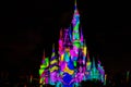 Illuminated and colorful Cinderella Castle in One Upon a Time Show at Magic Kingdom 4.