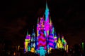 Illuminated and colorful Cinderella Castle in One Upon a Time Show at Magic Kingdom 3.