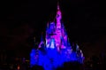 Illuminated and colorful Cinderella Castle in One Upon a Time Show at Magic Kingdom 8.