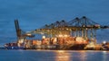 Illuminated container terminal at twilight, Port of Antwerp