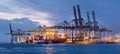 Illuminated container terminal at twilight, Port of Antwerp